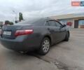 Серый Тойота Камри, объемом двигателя 2.4 л и пробегом 155 тыс. км за 7600 $, фото 2 на Automoto.ua