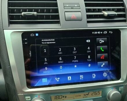 Серый Тойота Камри, объемом двигателя 2.36 л и пробегом 247 тыс. км за 10500 $, фото 9 на Automoto.ua