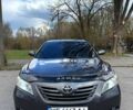 Серый Тойота Камри, объемом двигателя 2.4 л и пробегом 245 тыс. км за 7700 $, фото 1 на Automoto.ua