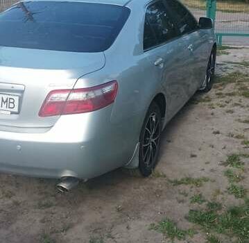 Серый Тойота Камри, объемом двигателя 2.4 л и пробегом 286 тыс. км за 9500 $, фото 4 на Automoto.ua