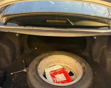 Сірий Тойота Камрі, об'ємом двигуна 2.36 л та пробігом 319 тис. км за 7900 $, фото 12 на Automoto.ua