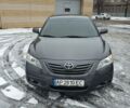 Сірий Тойота Камрі, об'ємом двигуна 2.4 л та пробігом 223 тис. км за 11600 $, фото 1 на Automoto.ua