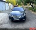 Серый Тойота Камри, объемом двигателя 2.4 л и пробегом 255000 тыс. км за 8000 $, фото 1 на Automoto.ua