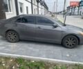 Сірий Тойота Камрі, об'ємом двигуна 2.4 л та пробігом 350 тис. км за 7000 $, фото 1 на Automoto.ua
