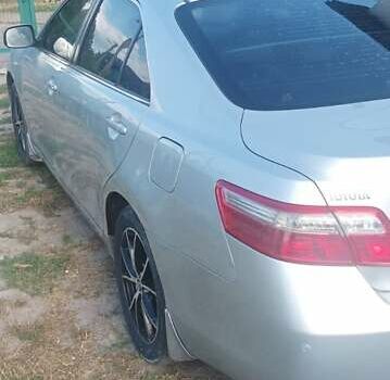 Серый Тойота Камри, объемом двигателя 2.4 л и пробегом 286 тыс. км за 9500 $, фото 6 на Automoto.ua