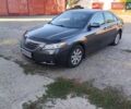 Сірий Тойота Камрі, об'ємом двигуна 2.36 л та пробігом 240 тис. км за 9000 $, фото 1 на Automoto.ua