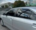Серый Тойота Камри, объемом двигателя 2.4 л и пробегом 138 тыс. км за 11500 $, фото 1 на Automoto.ua