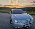 Серый Тойота Камри, объемом двигателя 2.4 л и пробегом 164 тыс. км за 10500 $, фото 1 на Automoto.ua