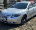 Серый Тойота Камри, объемом двигателя 2.4 л и пробегом 311 тыс. км за 7800 $, фото 1 на Automoto.ua
