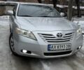 Серый Тойота Камри, объемом двигателя 2.4 л и пробегом 186 тыс. км за 8200 $, фото 1 на Automoto.ua