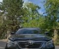 Серый Тойота Камри, объемом двигателя 2.4 л и пробегом 250 тыс. км за 8900 $, фото 1 на Automoto.ua