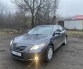 Серый Тойота Камри, объемом двигателя 2.4 л и пробегом 170 тыс. км за 7600 $, фото 1 на Automoto.ua