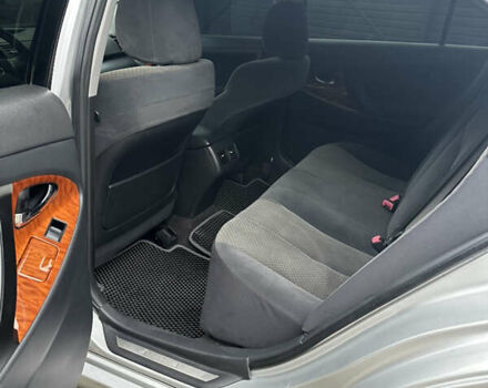 Серый Тойота Камри, объемом двигателя 2.4 л и пробегом 240 тыс. км за 7700 $, фото 2 на Automoto.ua