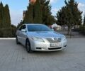 Серый Тойота Камри, объемом двигателя 2.4 л и пробегом 256 тыс. км за 7699 $, фото 1 на Automoto.ua