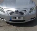 Серый Тойота Камри, объемом двигателя 2.4 л и пробегом 208 тыс. км за 8000 $, фото 1 на Automoto.ua