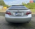 Серый Тойота Камри, объемом двигателя 2.4 л и пробегом 270 тыс. км за 8300 $, фото 3 на Automoto.ua