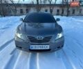 Серый Тойота Камри, объемом двигателя 2.4 л и пробегом 334 тыс. км за 8500 $, фото 1 на Automoto.ua