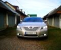 Серый Тойота Камри, объемом двигателя 2.4 л и пробегом 328 тыс. км за 8300 $, фото 1 на Automoto.ua