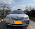 Серый Тойота Камри, объемом двигателя 2.4 л и пробегом 238 тыс. км за 7500 $, фото 1 на Automoto.ua