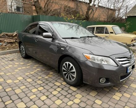 Сірий Тойота Камрі, об'ємом двигуна 2.4 л та пробігом 326 тис. км за 7500 $, фото 3 на Automoto.ua