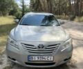 Сірий Тойота Камрі, об'ємом двигуна 2.4 л та пробігом 247 тис. км за 8514 $, фото 1 на Automoto.ua