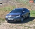 Серый Тойота Камри, объемом двигателя 2.36 л и пробегом 350 тыс. км за 7900 $, фото 1 на Automoto.ua