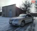 Серый Тойота Камри, объемом двигателя 2.4 л и пробегом 251 тыс. км за 8700 $, фото 1 на Automoto.ua