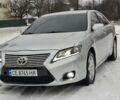 Серый Тойота Камри, объемом двигателя 2.49 л и пробегом 320 тыс. км за 7700 $, фото 1 на Automoto.ua
