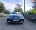 Серый Тойота Камри, объемом двигателя 2.49 л и пробегом 227 тыс. км за 12500 $, фото 1 на Automoto.ua