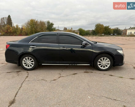 Серый Тойота Камри, объемом двигателя 2.49 л и пробегом 210 тыс. км за 15200 $, фото 2 на Automoto.ua