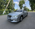 Серый Тойота Камри, объемом двигателя 2.49 л и пробегом 230 тыс. км за 11500 $, фото 1 на Automoto.ua
