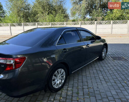 Сірий Тойота Камрі, об'ємом двигуна 2.5 л та пробігом 264 тис. км за 11500 $, фото 7 на Automoto.ua
