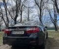 Серый Тойота Камри, объемом двигателя 2.49 л и пробегом 195 тыс. км за 14000 $, фото 15 на Automoto.ua