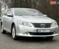 Серый Тойота Камри, объемом двигателя 2.49 л и пробегом 210 тыс. км за 12990 $, фото 1 на Automoto.ua