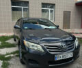 Серый Тойота Камри, объемом двигателя 2.49 л и пробегом 309 тыс. км за 7500 $, фото 1 на Automoto.ua