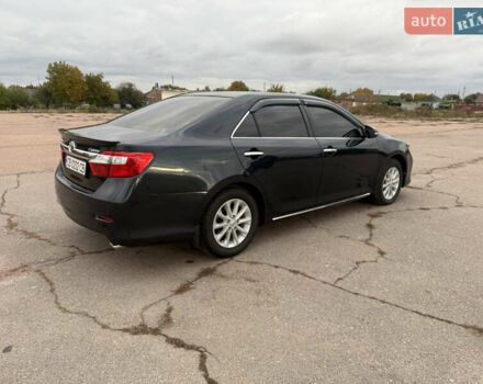 Серый Тойота Камри, объемом двигателя 2.49 л и пробегом 210 тыс. км за 15200 $, фото 3 на Automoto.ua