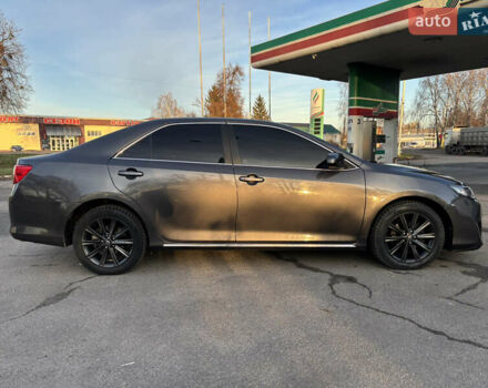 Сірий Тойота Камрі, об'ємом двигуна 2.49 л та пробігом 190 тис. км за 11800 $, фото 2 на Automoto.ua