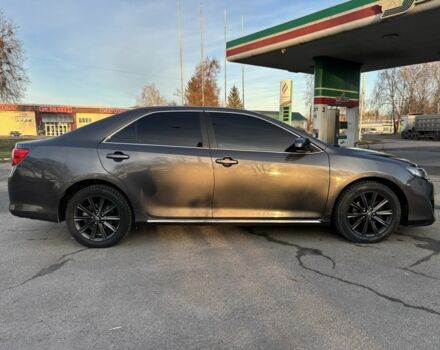 Серый Тойота Камри, объемом двигателя 2.5 л и пробегом 190 тыс. км за 11800 $, фото 2 на Automoto.ua