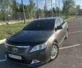 Серый Тойота Камри, объемом двигателя 2.46 л и пробегом 259 тыс. км за 14500 $, фото 1 на Automoto.ua