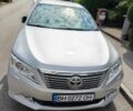 Серый Тойота Камри, объемом двигателя 2.49 л и пробегом 210 тыс. км за 11750 $, фото 1 на Automoto.ua