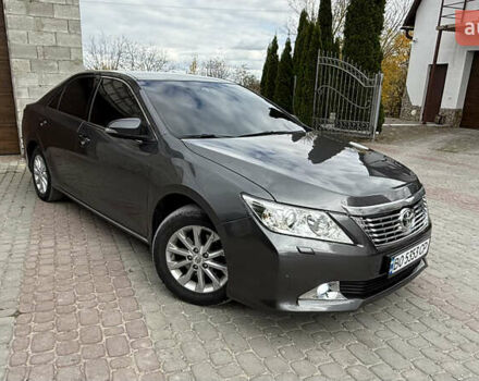 Серый Тойота Камри, объемом двигателя 2.49 л и пробегом 252 тыс. км за 11499 $, фото 1 на Automoto.ua