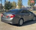 Серый Тойота Камри, объемом двигателя 2.5 л и пробегом 323 тыс. км за 9990 $, фото 6 на Automoto.ua