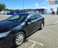 Серый Тойота Камри, объемом двигателя 2.5 л и пробегом 251 тыс. км за 11500 $, фото 1 на Automoto.ua