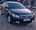 Серый Тойота Камри, объемом двигателя 0.25 л и пробегом 262 тыс. км за 12800 $, фото 1 на Automoto.ua