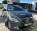 Серый Тойота Камри, объемом двигателя 2.49 л и пробегом 265 тыс. км за 11000 $, фото 1 на Automoto.ua