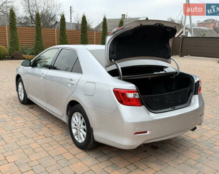 Сірий Тойота Камрі, об'ємом двигуна 2.5 л та пробігом 232 тис. км за 12800 $, фото 20 на Automoto.ua