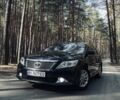 Серый Тойота Камри, объемом двигателя 2.5 л и пробегом 280 тыс. км за 12499 $, фото 1 на Automoto.ua