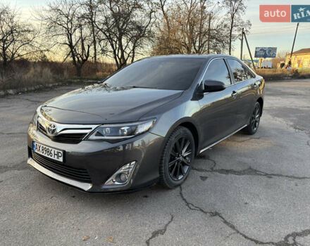 Сірий Тойота Камрі, об'ємом двигуна 2.49 л та пробігом 190 тис. км за 11800 $, фото 1 на Automoto.ua