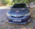 Серый Тойота Камри, объемом двигателя 2.49 л и пробегом 220 тыс. км за 13000 $, фото 1 на Automoto.ua