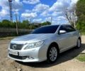 Сірий Тойота Камрі, об'ємом двигуна 2.5 л та пробігом 242 тис. км за 13200 $, фото 1 на Automoto.ua